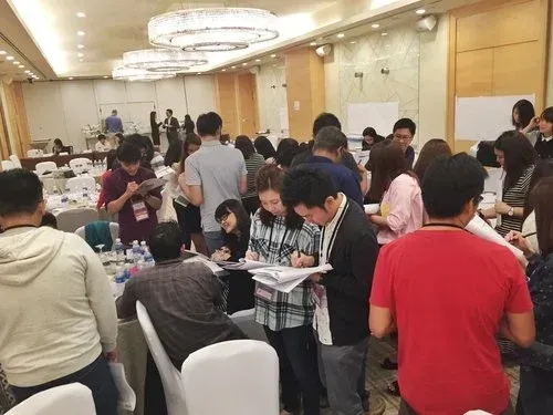 StrengthsFinder Singapore Teambuilding Workshop Strengths School large group interactive discussion.